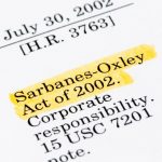An image of Sarbanes-Oxley Act of 2002 Corporate Responsibility 15 USC 7201 printed on white paper.